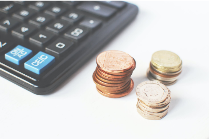 calculator  and coins
